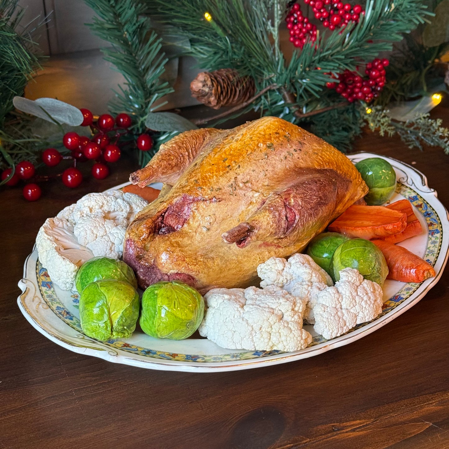Roast pheasant with vegetables on a lovely oval plate