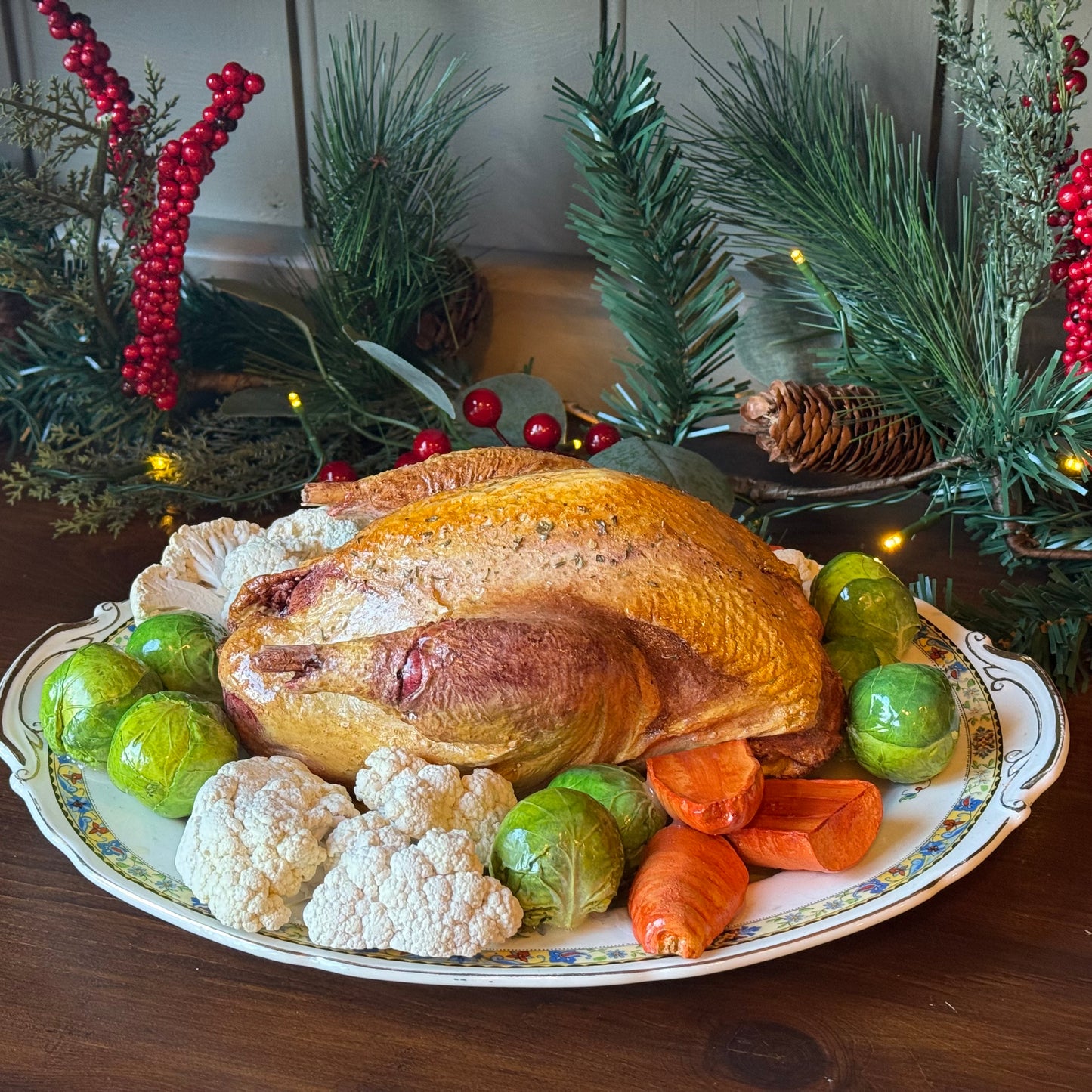 Roast pheasant with vegetables on a lovely oval plate