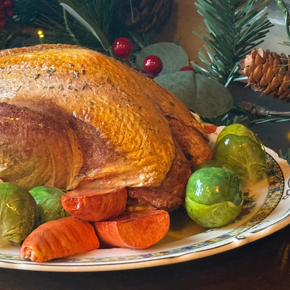 Roast pheasant with vegetables on a lovely oval plate