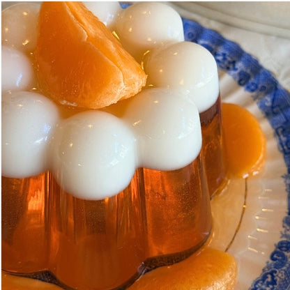 Orange and White Jelly on Blue Plate