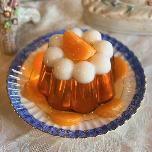 Orange and White Jelly on Blue Plate
