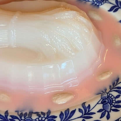 Pink Harvest Blancmange on a Blue Oval Plate